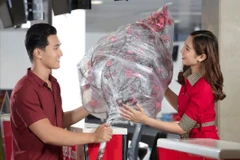 Vietjet nhận vận chuyển mai, đào dịp Tết Nguyên đán Quý Mão năm 2023. (Ảnh: CTV/Vietnam+)