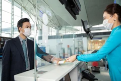 Vietnam Airlines triển khai dịch vụ làm thủ tục trực tuyến ở sân bay Buôn Ma Thuột. (Ảnh: CTV/Vietnam+)