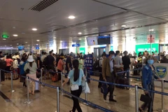 Khu vực soi chiếu an ninh sảnh A sân bay Tân Sơn Nhất. (Ảnh: Tiến Lực/TTXVN)