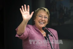 Ứng viên Michelle Bachelet tại điểm bỏ phiếu ở thủ đô Santiago ngày 17/11. (Nguồn: THX/TTXVN)
