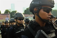 Cảnh sát Indonesia. (Ảnh: AFP/TTXVN)