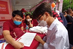 Lựa chọn ngành nghề nào là băn khoăn của rất nhiều thí sinh mỗi khi mùa tuyển sinh bắt đầu. (Ảnh: PM/Vietnam+)