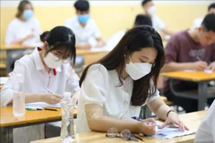 Thí sinh dự thi tốt nghiệp trung học phổ thông. (Ảnh: TTXVN)