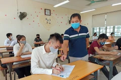 Thí sinh dự thi Tốt nghiệp Trung học phổ thông. (Ảnh: PM/Vietnam+)