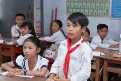 Chương trình giáo dục phổ thông mới đang được triển khai ở cả ba cấp học. (Ảnh: PV/TTXVN)