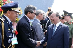 Thủ tướng Nguyễn Xuân Phúc và các đại biểu tham dự lễ kỷ niệm. (Ảnh: Thống Nhất /TTXVN)