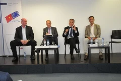 Các diễn giả tại cuộc hội thảo. (Ảnh: Kim Chung/TTXVN)