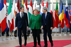 Tổng thống Pháp Emmanuel Macron, Thủ tướng Đức Angela Merkel và Thủ tướng Italy Paolo Gentiloni tại Hội nghị lãnh đạo các nước thành viên EU ở Brussels (Bỉ) ngày 23/2. (Nguồn: THX/TTXVN)