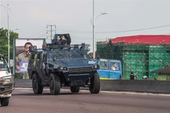 Cảnh sát tuần tra tại Kinshasa, Cộng hòa Dân chủ Congo. (Ảnh: AFP/TTXVN)