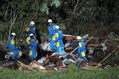 Tìm kiến nạn nhân vụ động đất. (Nguồn: AFP)