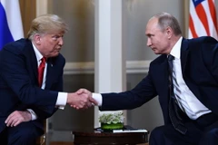 Tổng thống Nga Vladimir Putin (phải) và Tổng thống Mỹ Donald Trump tại hội nghị thượng đỉnh ở Helsinki, Phần Lan ngày 16/7. (Ảnh: AFP/TTXVN)