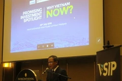 Tham tán Thương mại Việt Nam tại Malaysia Phạm Quốc Anh phát biểu tại hội thảo. (Ảnh: Cơ quan thường trú TTXVN tại Malaysia)