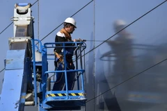 Công nhân làm việc tại Berlin, Đức. (Nguồn: AFP/TTXVN)