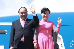 Thủ tướng Chính phủ Nguyễn Xuân Phúc và Phu nhân. (Ảnh: Thống Nhất/TTXVN)