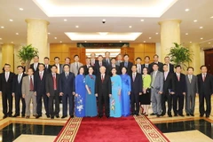 Tổng Bí thư Nguyễn Phú Trọng chụp ảnh chung với các đại biểu. (Ảnh: Trí Dũng/TTXVN)