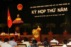 Chủ tịch Hội đồng Nhân dân Thành phố Hồ Chí Minh Nguyễn Thị Quyết Tâm phát biểu khai mạc kỳ họp. (Ảnh: Thanh Vũ/TTXVN)