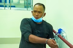 Đối tượng Trương Ngọc Long tại cơ quan Công an. (Ảnh: TTXVN phát)