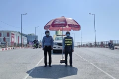 Lực lượng chức năng Campuchia làm nhiệm vụ tại Koh Pich. (Ảnh: TTXVN/phát)