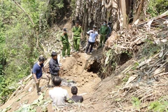 Hiện trường nơi thi thể nạn nhân Lù Kim Mìn được tìm thấy. (Ảnh: TTXVN phát)