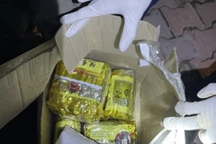 Số tang vật thu được tại nhà các đối tượng. (Ảnh: TTXVN phát)