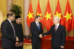 Tổng Bí thư, Chủ tịch nước Nguyễn Phú Trọng nói chuyện với các Đại sứ. (Ảnh: Trí Dũng/TTXVN)