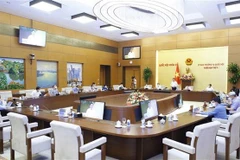 Quang cảnh bế mạc phiên họp thứ ba của Ủy ban Thường vụ Quốc hội. (Ảnh: Doãn Tấn/TTXVN)