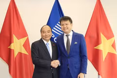 Chủ tịch nước Nguyễn Xuân Phúc với Tổng giám đốc Tổ chức Sở hữu trí tuệ thế giới (WIPO) Daren Tang. (Ảnh: Thống Nhất/TTXVN) 