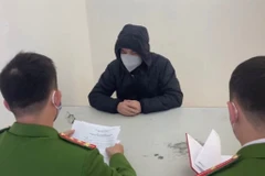 Đối tượng Chu Văn Bắc tại Cơ quan Công an điều tra. (Ảnh: Lục Canh/TTXVN phát)