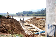 Đường dẫn nước từ sông Krông Nô vào trạm bơm bị đánh giá là chưa phù hợp vì không có bể hút. (Ảnh: Ngọc Minh/TTXVN)