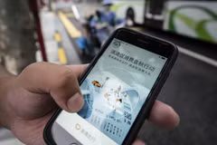 Ứng dụng đặt xe của Didi Global Inc trên điện thoại tại Trung Quốc. (Nguồn: Bloomberg) 