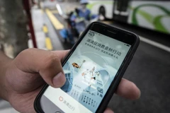 Ứng dụng đặt xe của Didi Global Inc trên điện thoại tại Trung Quốc. (Nguồn: Bloomberg) 