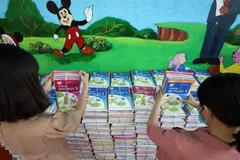 Năm học 2021-2022, chương trình giáo dục phổ thông mới, sách giáo khoa mới tiếp tục được triển khai ở lớp 2 và lớp 6. (Ảnh: TTXVN)