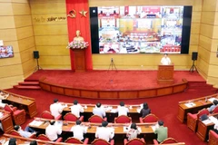 Trung tâm Điều hành bầu cử tỉnh Quảng Ninh kết nối từ tỉnh đến xã, phường, thị trấn. (Ảnh: Văn Đức /TTXVN)