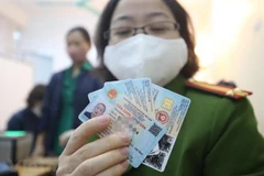 Cận cảnh mẫu thẻ căn cước công dân gắn chip mới được ban hành. (Nguồn: Vietnam+)