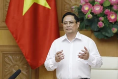 Thủ tướng Phạm Minh Chính nhấn mạnh nghiên cứu nhanh nhất, sản xuất nhanh nhất, hiệu quả nhất, để có vaccine ngừa COVID-19 tiêm cho người dân trên tinh thần 3 không, 5 thật. (Ảnh: Dương Giang/TTXVN)