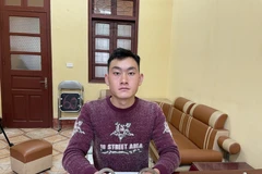 Đối tượng Chang A Phình tại cơ quan công an. (Ảnh: TTXVN phát)