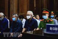 Các bị cáo tại phiên tòa ngày 27/11. (Ảnh: Thành Chung/TTXVN) 
