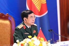 Đại tướng Phan Văn Giang, Bộ trưởng Bộ Quốc phòng Việt Nam, dự hội nghị tại điểm cầu Hà Nội. (Ảnh: Trọng Đức/TTXVN) 