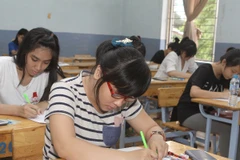 Thí sinh tham dự kỳ thi tuyển sinh đại học, cao đẳng năm 2013. (Ảnh: Phương Vy/TTXVN)