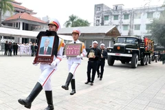 Linh xa đưa linh cữu đồng chí Nguyễn Phúc Thanh từ Nhà tang lễ Quốc gia về nơi an nghỉ cuối cùng. (Ảnh: Văn Điệp/TTXVN)