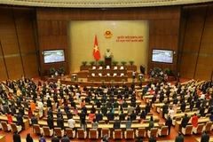 Toàn cảnh lễ chào cờ bế mạc Kỳ họp thứ 11, Quốc hội khóa XIV. (Ảnh: Văn Điệp/TTXVN)