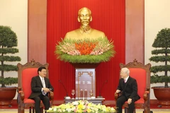 Tổng Bí thư, Chủ tịch nước Nguyễn Phú Trọng tiếp Thủ tướng Lào Thongloun Sisoulith nhân dịp ông Thongloun Sisoulith sang Việt Nam dự Kỳ họp lần thứ 43 Ủy ban liên Chính phủ Việt-Lào về hợp tác song phương hồi tháng 12/2020. (Ảnh: Trí Dũng/TTXVN)