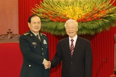 Tổng Bí thư Nguyễn Phú Trọng, Bí thư Quân ủy Trung ương tiếp Thượng tướng Ngụy Phượng Hòa, Ủy viên Quốc vụ, Bộ trưởng Bộ Quốc phòng Trung Quốc sang thăm chính thức Việt Nam. (Ảnh: Trí Dũng/TTXVN)