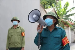 Tổ phòng, chống COVID cộng đồng thôn Phúc Ninh, xã Ninh Sơn, huyện Việt Yên, tỉnh Bắc Giang. (Ảnh: Danh Lam/TTXVN)