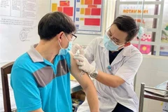 Tiêm vaccine phòng COVID-19. (Nguồn: TTXVN)