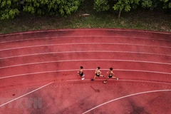 Một buổi tập của đội tuyển điền kinh quốc gia. (Ảnh: Thành Đạt/TTXVN)