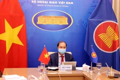 Thứ trưởng Bộ Ngoại giao Nguyễn Quốc Dũng dự Đối thoại ASEAN-Hoa Kỳ lần thứ 34 theo hình thức trực tuyến. (Ảnh: Phạm Kiên/TTXVN)