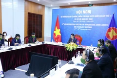 Trung tướng Lương Tam Quang, Thứ trưởng Bộ Công an tham dự Phiên họp toàn thể Hội nghị Bộ trưởng ASEAN về phòng, chống tội phạm xuyên quốc gia lần thứ 15 (AMMTC 15) và các hội nghị liên quan theo hình thức trực tuyến. (Ảnh: Phạm Kiên/TTXVN)