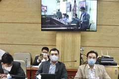 Điểm cầu tỉnh Điện Biên báo cáo tình hình phòng, chống dịch COVID-19 trên địa bàn tỉnh. (Ảnh: Minh Quyết/TTXVN)