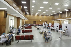 Khu vực tiêm chủng vaccine phòng COVID-19 tại trường Đại học Bách khoa Hà Nội. (Ảnh: Minh Quyết/TTXVN)